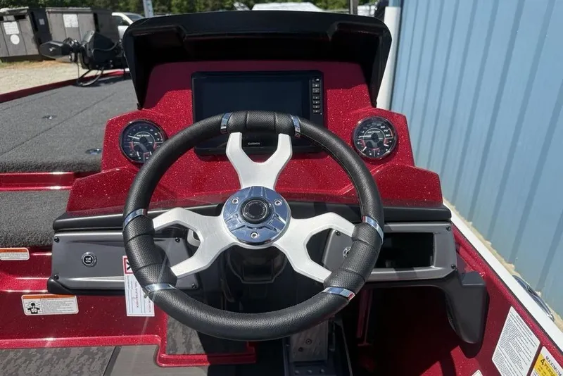 Slide: The Image of Steering console of 2026 Nitro Z20 XL Pro boat with modern dashboard and controls. - 21