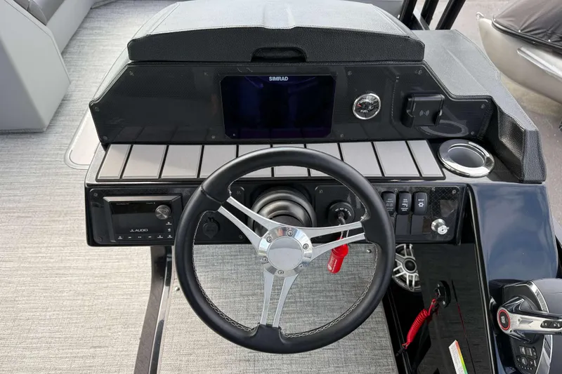 Slide: The Image of Steering console of 2025 Premier 250 Solaris Upper Deck - CL pontoon boat. - 10
