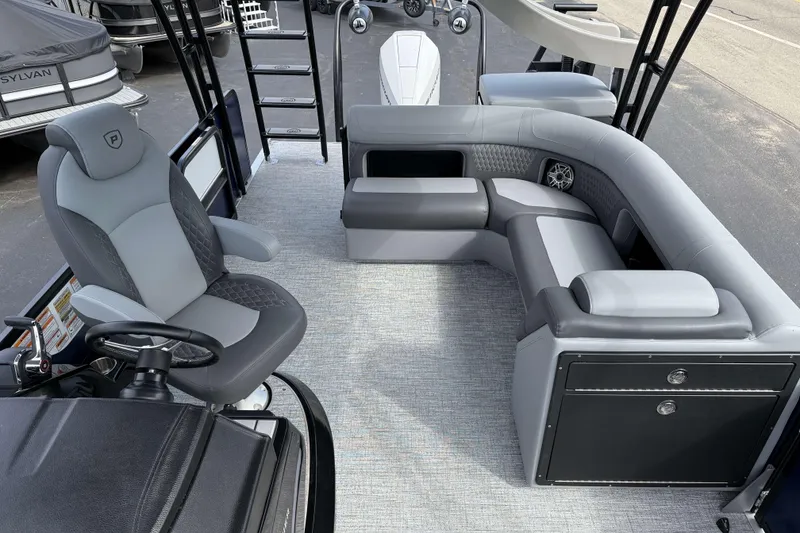 Slide: The Image of 2025 Premier 250 Solaris Upper Deck - CL boat interior with seating and steering area. - 15