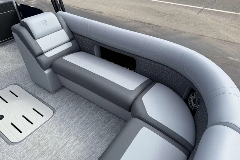 Slide: The Image of Luxurious seating on 2025 Premier 250 Solaris Upper Deck pontoon boat, featuring elegant upholstery. - 19