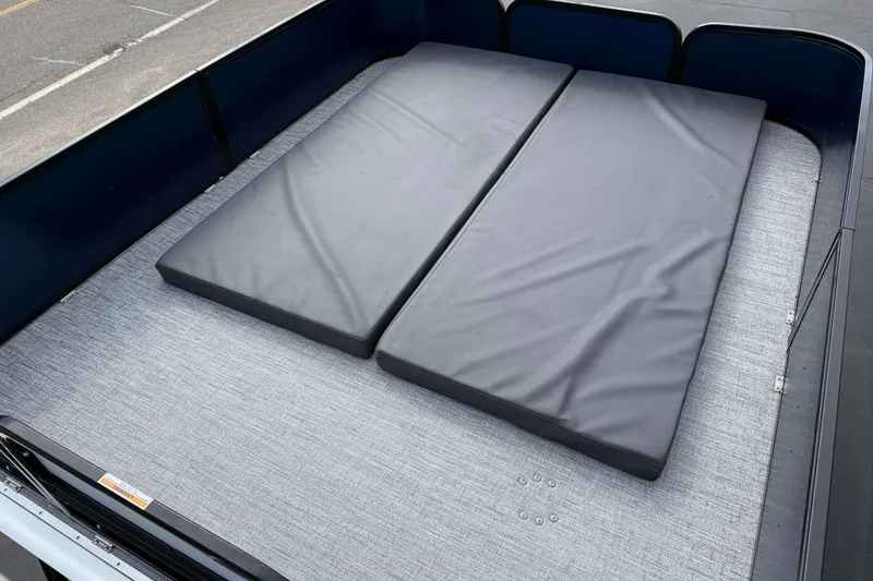 Slide: The Image of 2025 Premier 250 Solaris Upper Deck - CL with cushioned seating on a textured surface. - 22