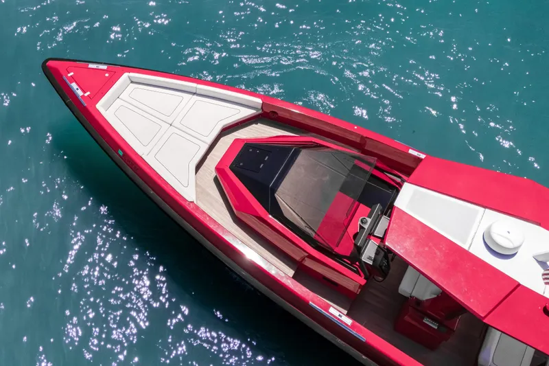 Slide: The Image of Red 2021 Wally 48 yacht on sparkling turquoise water, aerial view. - 13