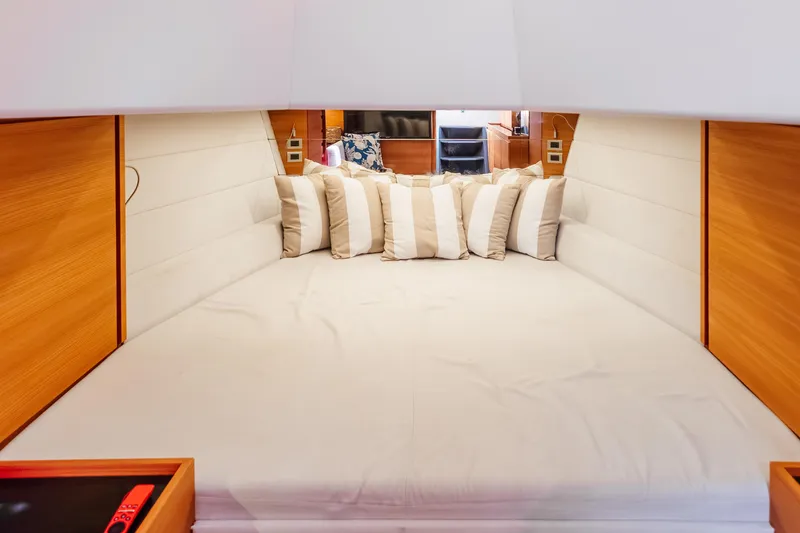 Slide: The Image of Luxurious interior of 2021 Wally 48 yacht with plush bedding and modern design. - 52