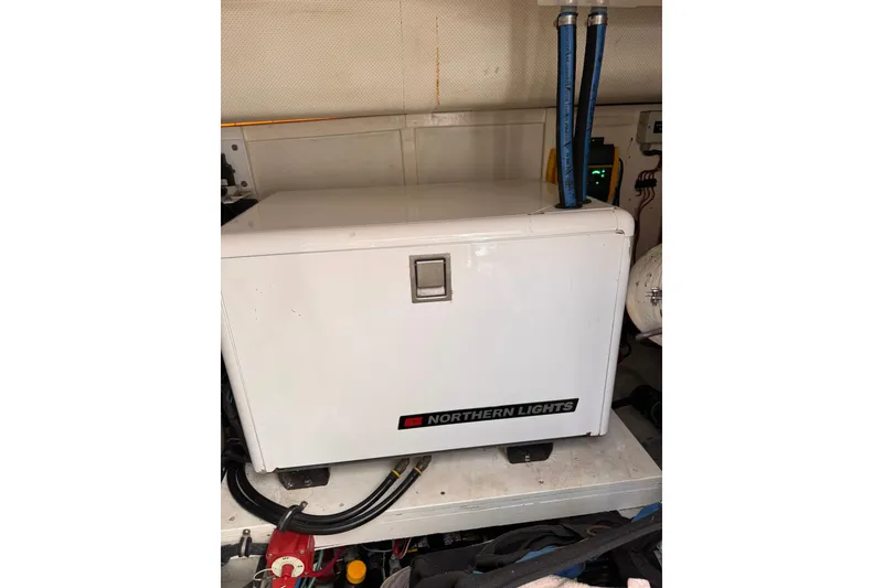 Slide: The Image of Northern Lights generator in 1999 Grand Banks 38 Eastbay EX engine room. - 36