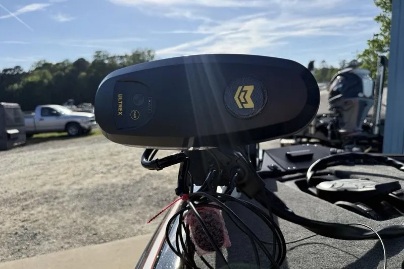 Slide: The Image of 2026 Skeeter ZX200 boat with Ultrex trolling motor in a sunny outdoor setting. - 11