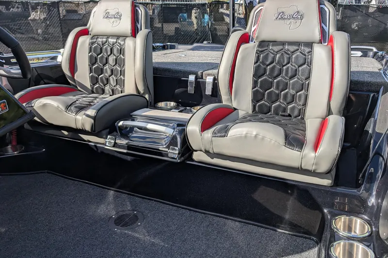 Slide: The Image of 2026 Bass Cat Cougar FTD boat seats with hexagonal pattern and red accents. - 14