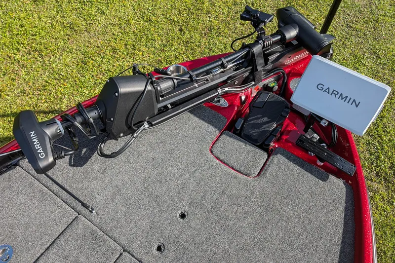 Slide: The Image of 2026 Bass Cat Cougar FTD boat deck with Garmin electronics and trolling motor. - 15