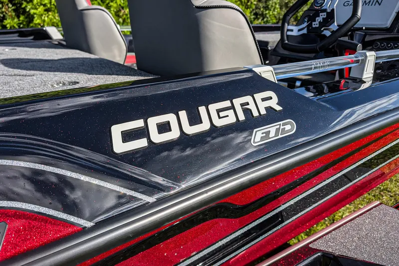 Slide: The Image of 2026 Bass Cat Cougar FTD boat with sleek design and modern features. - 9