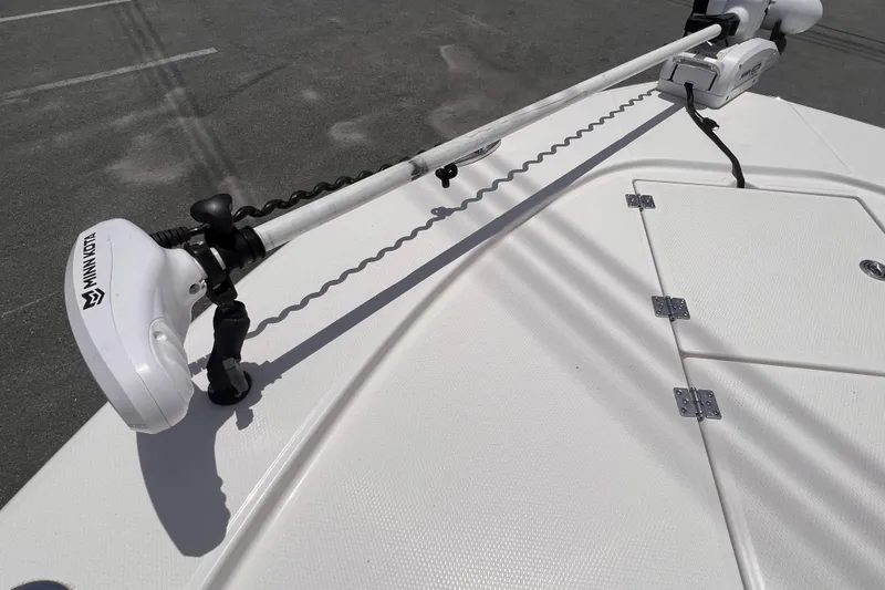Slide: The Image of Minn Kota trolling motor on 2022 Robalo 246 Cayman boat deck. - 6