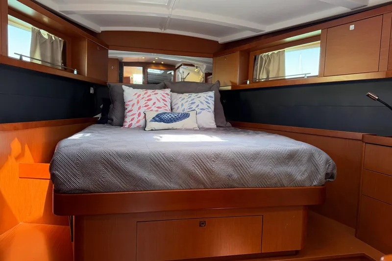 Slide: The Image of Luxurious cabin interior of 2016 Beneteau Oceanis 48 yacht with cozy bedding. - 43
