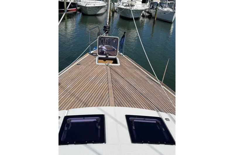 Slide: The Image of Deck view of 2016 Beneteau Oceanis 48 yacht docked at marina. - 6