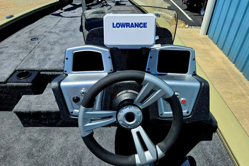 Slide: The Image of Steering console of 2026 Tracker Pro Team 190 boat with Lowrance electronics. - 23