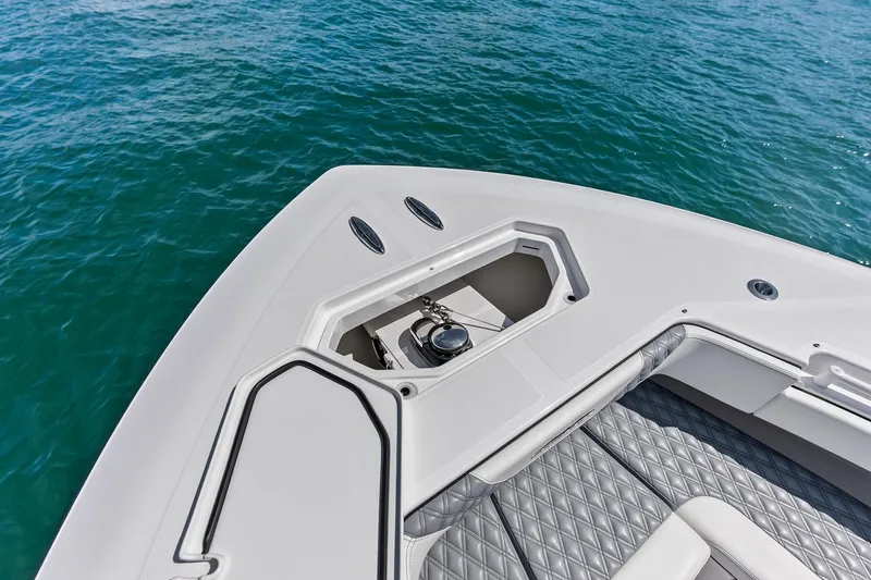 Slide: The Image of Bow view of 2024 Invincible 43 Open Fisherman on water. - 29
