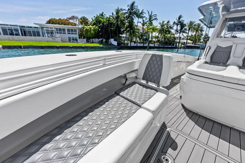 Slide: The Image of 2024 Invincible 43 Open Fisherman boat interior with luxurious seating and sleek design. - 33