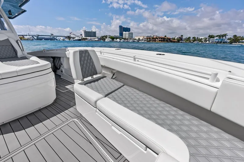 Slide: The Image of 2024 Invincible 43 Open Fisherman boat interior with luxurious seating and ocean view. - 34