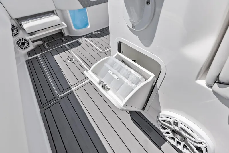 Slide: The Image of 2024 Invincible 43 Open Fisherman boat interior with storage compartment and sleek flooring. - 36