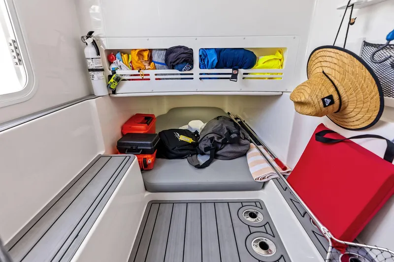 Slide: The Image of Interior of 2024 Invincible 43 Open Fisherman with storage, gear, and seating. - 42