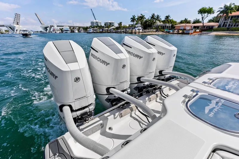 Slide: The Image of 2024 Invincible 43 Open Fisherman with four Mercury Verado engines on the water. - 46