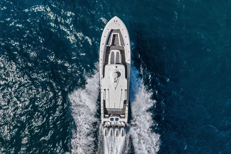 Slide: The Image of Aerial view of 2024 Invincible 43 Open Fisherman cruising on ocean waters. - 7