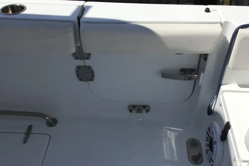 Slide: The Image of 2024 Sea Hunt Gamefish 28 Coffin Box interior, featuring seating and storage compartments. - 43