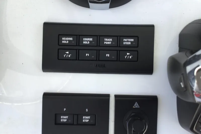 Slide: The Image of Control panel of 2024 Sea Hunt Gamefish 28 Coffin Box boat with navigation buttons. - 56