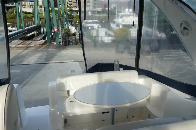 Slide: The Image of Interior view of 2002 Bayliner 2855 Ciera boat with seating and table. - 19