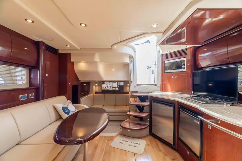 Slide: The Image of Luxurious interior of 2009 Sea Ray 40 Sundancer yacht with modern amenities and elegant design. - 23