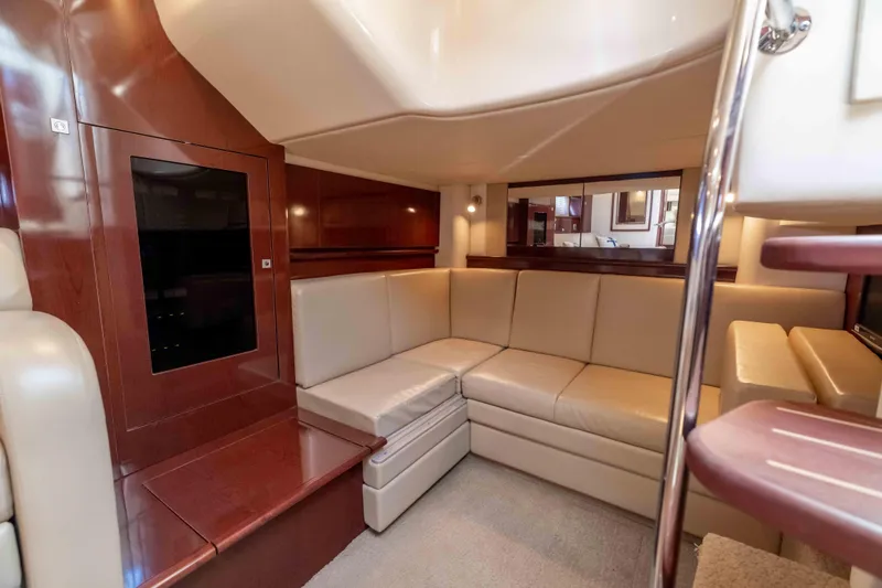 Slide: The Image of Luxurious interior of 2009 Sea Ray 40 Sundancer yacht with beige leather seating. - 27