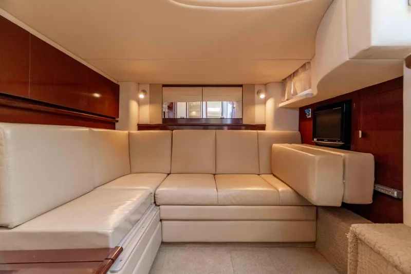 Slide: The Image of Luxurious interior of 2009 Sea Ray 40 Sundancer yacht with beige leather seating. - 28