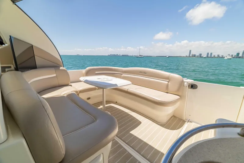 Slide: The Image of Luxurious 2009 Sea Ray 40 Sundancer yacht interior with ocean view and city skyline. - 39