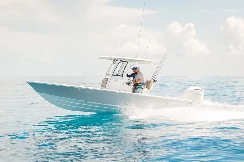 The Image of Manufacturer Provided Image: 2025 Sportsman Masters 247 Bay Boat cruising on clear blue water. - 0