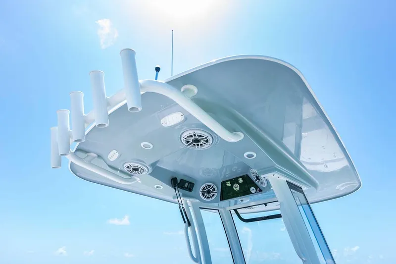 Slide: The Image of Manufacturer Provided Image: 2025 Sportsman Masters 247 Bay Boat T-top with rod holders and speakers. - 13