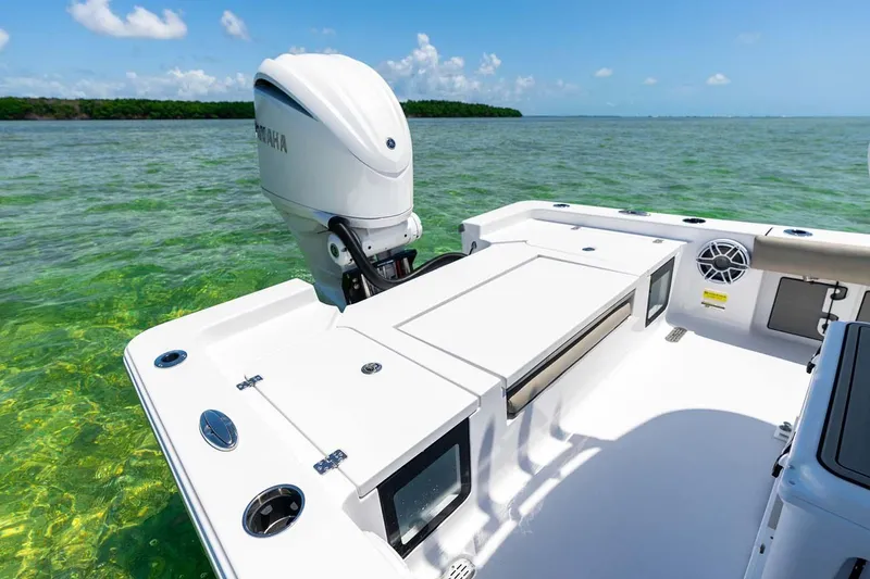 Slide: The Image of Manufacturer Provided Image: 2025 Sportsman Masters 247 Bay Boat on clear water, featuring a Yamaha outboard motor. - 21