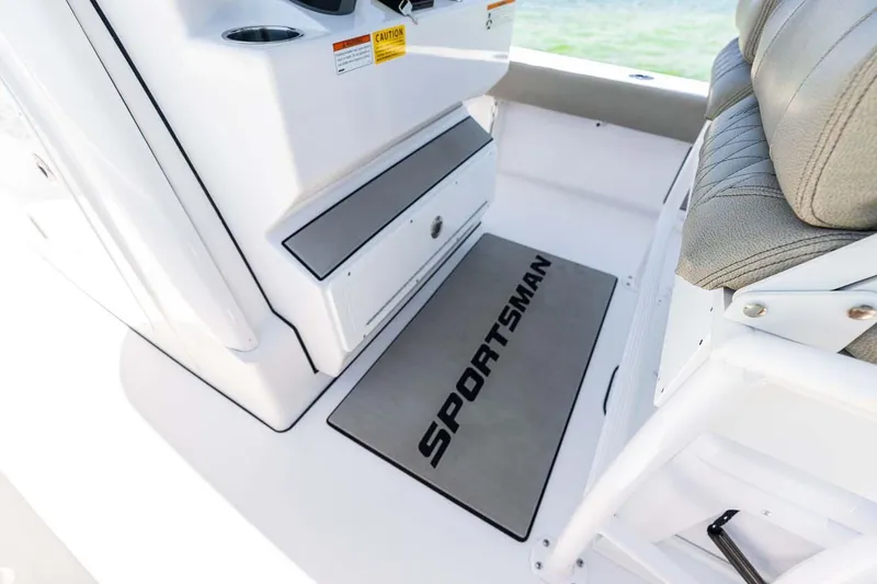 Slide: The Image of Manufacturer Provided Image: 2025 Sportsman Masters 247 Bay Boat interior with branded mat and seating. - 22