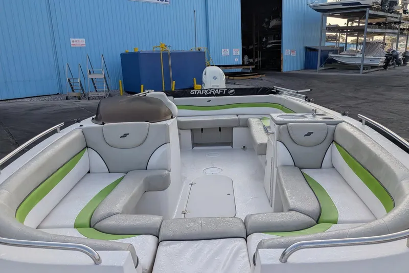 Slide: The Image of 2018 Starcraft MDX 211 O/B boat with spacious seating and modern design. - 8