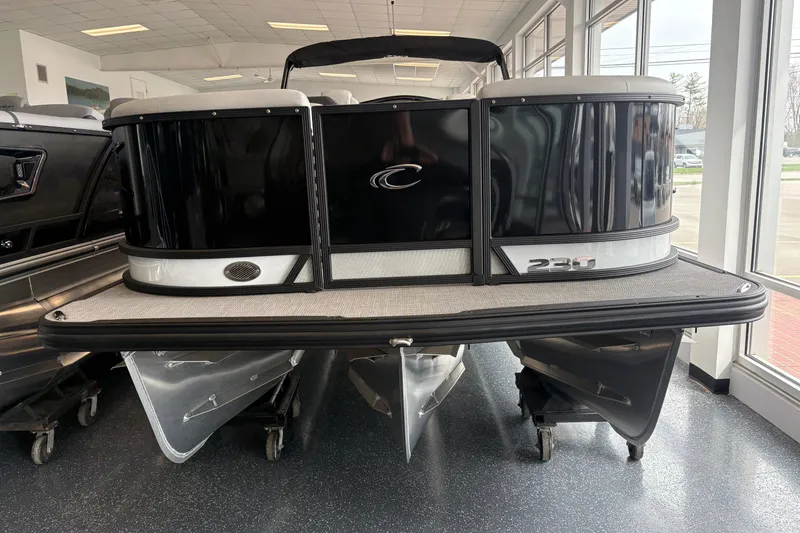 The Image of 2026 Crest 230 SLRC Caribbean pontoon boat displayed indoors. - 1