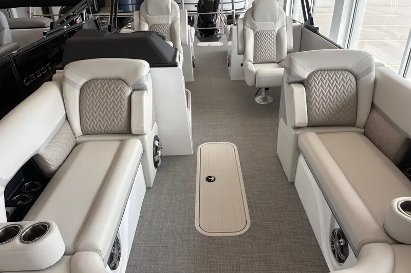 Slide: The Image of Luxurious interior of 2026 Crest 230 SLRC Caribbean boat with plush seating and modern design. - 4