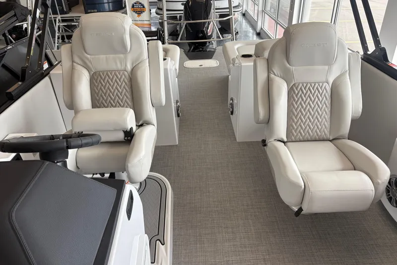 Slide: The Image of 2026 Crest 230 SLRC Caribbean boat interior with luxurious white seating and modern design. - 5