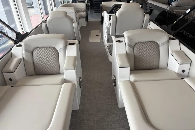 Slide: The Image of Luxurious interior of 2026 Crest 230 SLRC Caribbean boat with plush seating and modern design. - 6
