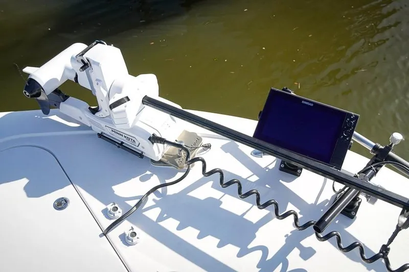 Slide: The Image of Tidewater 3100 Carolina Bay 2026 boat with Minn Kota trolling motor and Simrad display. - 22