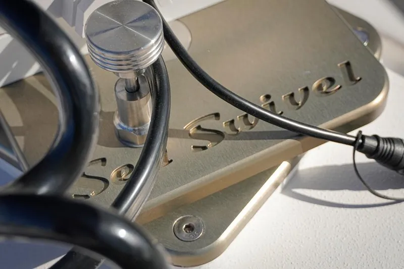 Slide: The Image of Close-up of Sea Swivel mechanism on 2026 Tidewater 3100 Carolina Bay boat. - 25