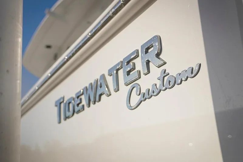 Slide: The Image of 2026 Tidewater 3100 Carolina Bay boat with "Tidewater Custom" logo. - 4