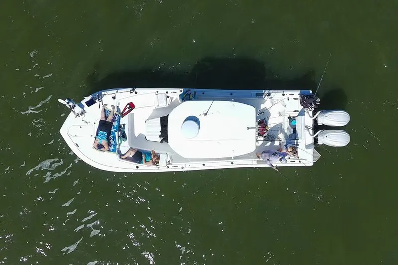 Slide: The Image of Overhead view of 2026 Tidewater 3100 Carolina Bay boat on water. - 43