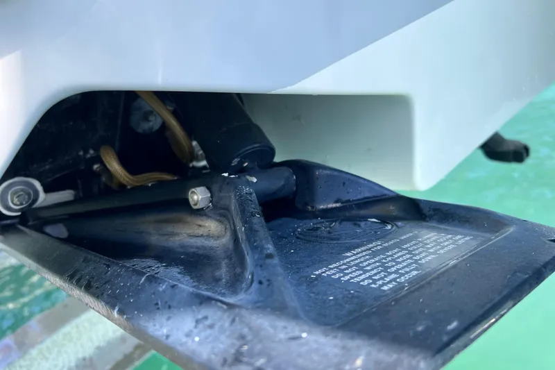 Slide: The Image of Trim tab detail on a 2005 Hydra-Sports Vector 3300 VX boat. - 100