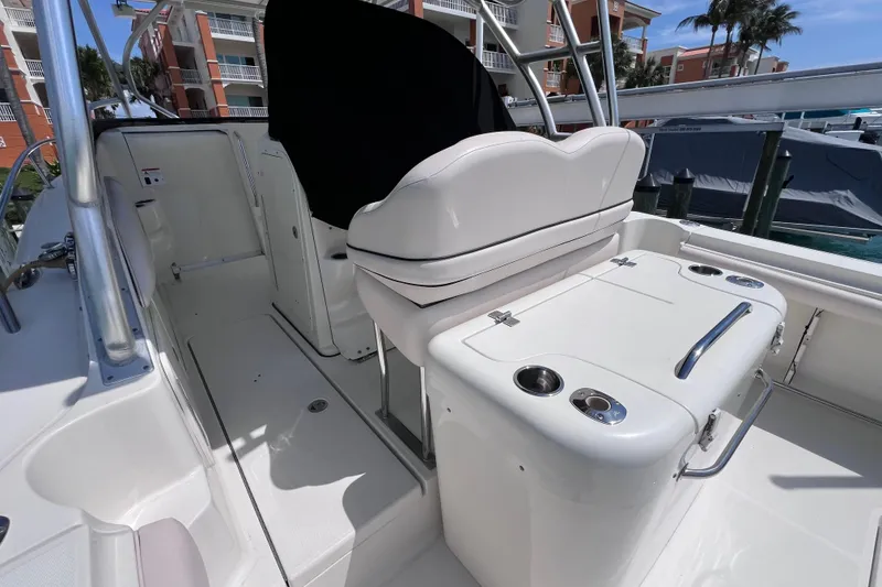 Slide: The Image of 2005 Hydra-Sports Vector 3300 VX boat interior with seating and storage compartments. - 21