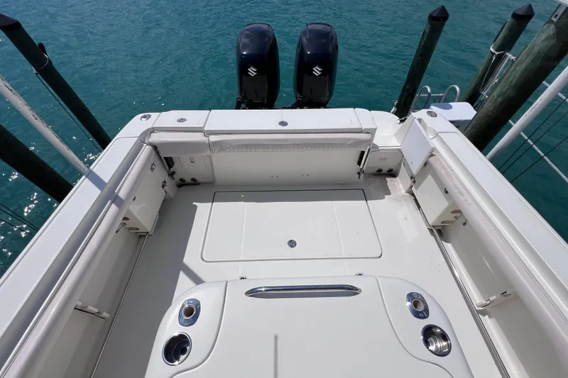 Slide: The Image of 2005 Hydra-Sports Vector 3300 VX boat deck with twin outboard motors. - 23