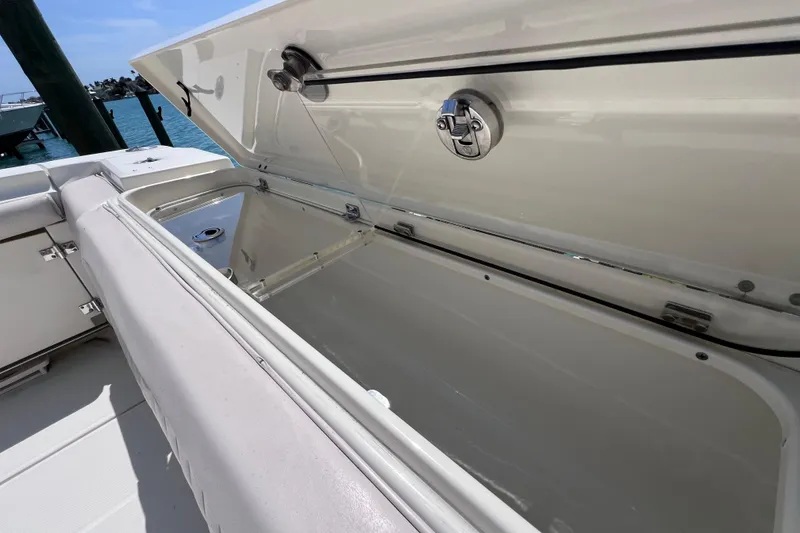 Slide: The Image of Open storage compartment on a 2005 Hydra-Sports Vector 3300 VX boat. - 30