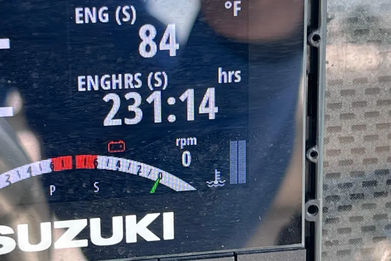 Slide: The Image of Suzuki engine display showing 231 hours on a 2005 Hydra-Sports Vector 3300 VX. - 35
