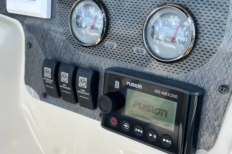Slide: The Image of Dashboard of 2005 Hydra-Sports Vector 3300 VX with gauges and Fusion MS-NRX300. - 44