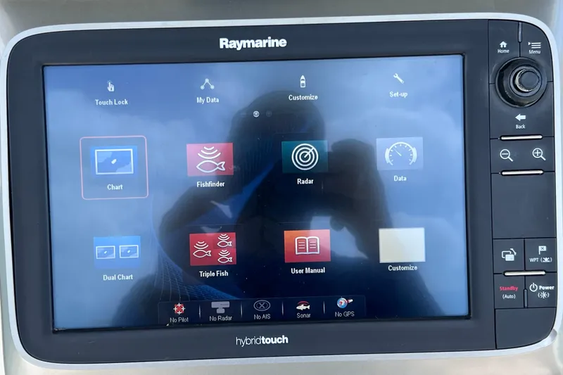 Slide: The Image of Raymarine hybrid touch display on 2005 Hydra-Sports Vector 3300 VX boat, showing navigation options. - 48